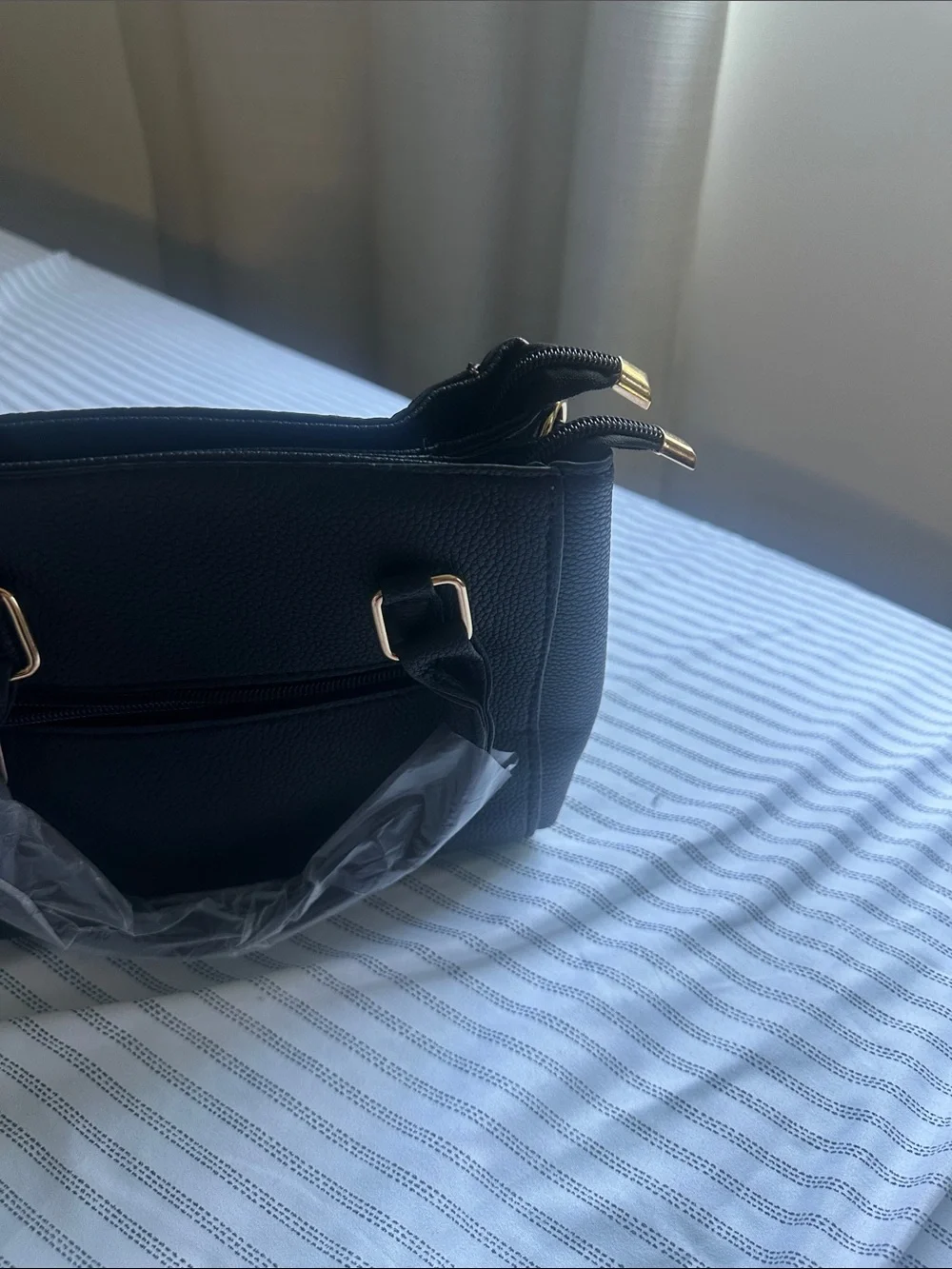 Black structure Macy’s brand full Leather hand back